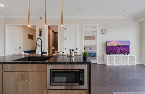 Currie Barracks Condo | Family Modern 2BR Condo with City View, DT, Balcony, F/Parking&In-Suite Laundry!