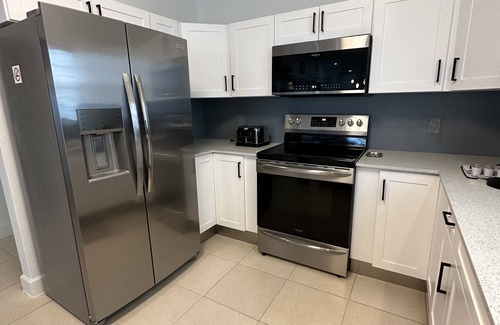 Colliers Bay Condo | FAMILY SIZE CONDO VIEWS OF CARIBBEAN,MANY AMENITIES, FREE WIFI, NO RESORT FEES
