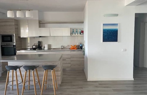 Golem Apartment | Family sized Beachside Apt, with sunset views + BBQ