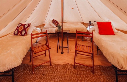 Tropic House | Family Tent w/Shared Bathroom - Beauty awaits you just past the red cliffs.