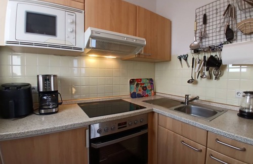 Schillig Apartment | Family vacation apartment close to the beach on the North Sea with balcony and sea view - Hus
