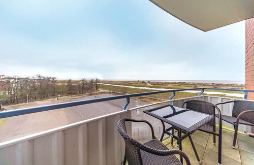 Schillig Apartment | Family vacation apartment close to the beach on the North Sea with balcony and sea view - Hus