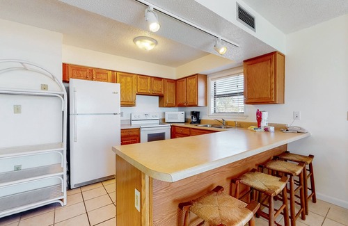 Orange Beach Condo | Fantastic beachside condo with pool, sauna, WiFi & central AC