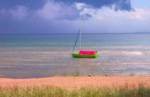 Nadeau House | Fantastic Lakeside Log Cabin Rental for Six in Cedar River, Michigan