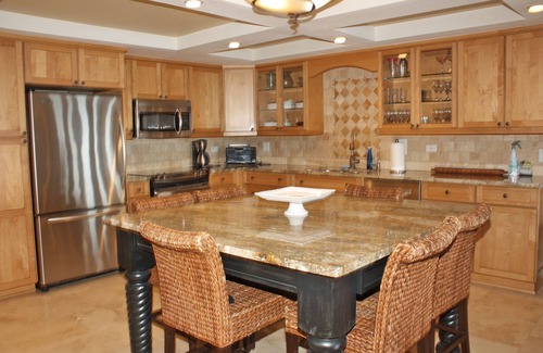 New Smyrna Beach Condo | Fantastic Oceanfront three bedroom. Travertine floors, custom kitchen and bathrooms. Luxury Condo!