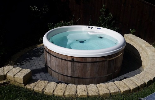 Brighstone House | Fantastic, sociable home in the beautiful village of Brighstone, with hot tub.