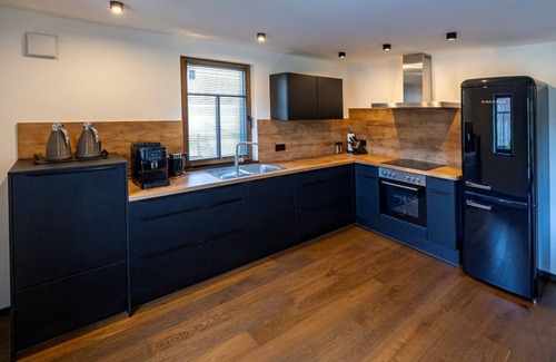 Kirchberg an der Jagst House | Farmhouse idyll meets home design - whirlpool, sauna and fireplace