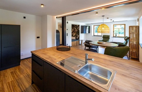 Kirchberg an der Jagst House | Farmhouse idyll meets home design - whirlpool, sauna and fireplace
