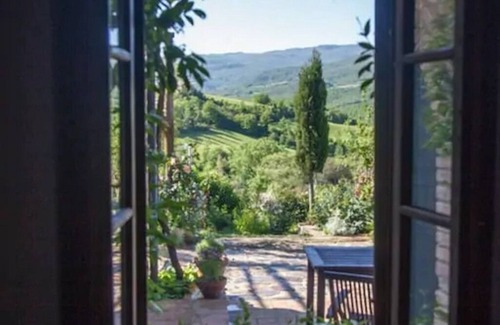Castelnuovo di Val di Cecina Apartment | Farmhouse from 17th century with antique furniture and many flowers.