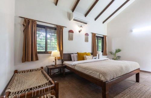 Nashik Villa | Farmhouse Retreat by StayVista - Classic architecture, Rustic interiors, Cozy rooms & A refreshing swimming pool