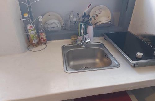 Filoti House | Fasolas square studio 15m2 is located 30 stairs up from the main road and it is in the old market fasolas and next to the museums