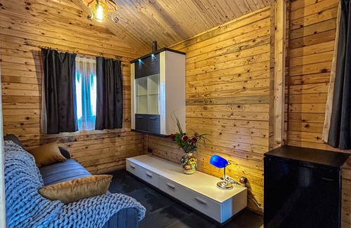 Baile Herculane Cabin | Featuring mountain views, this lodge features a garden, grill, WiFi and parking.