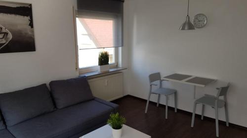 Renningen Apartment | Ferien- und Businessapartment I Modern mit WLAN und Parkplatz nahe Zentrum, Automobil- und Tech-Firmen, Messe