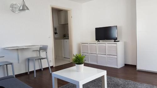 Renningen Apartment | Ferien- und Businessapartment I Modern mit WLAN und Parkplatz nahe Zentrum, Automobil- und Tech-Firmen, Messe