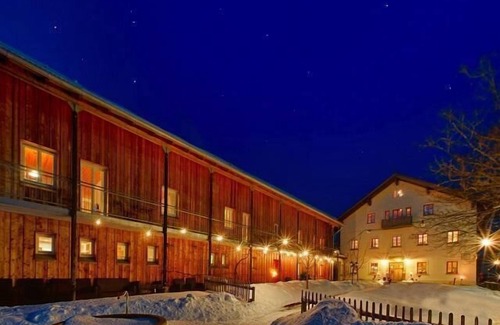 Bohmzwiesel Apartment | Ferienchalet mit großer überdachter Veranda mit Lounge Möbel