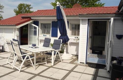 Onderdijk House | Ferienhaus De Graaf mit einer sonnigen Terrasse und Garten IJsselmeer