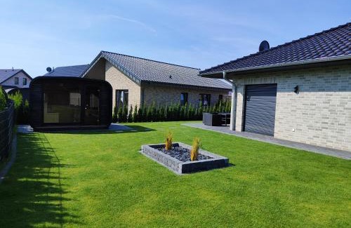 Barssel House | Ferienhaus Devilina mit Sauna am Harkebrügger See