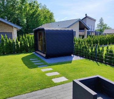 Barssel House | Ferienhaus Devilina mit Sauna am Harkebrügger See