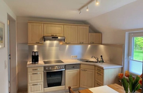 Nesse House | Ferienhaus Muschel mit Garten an der Nordsee
