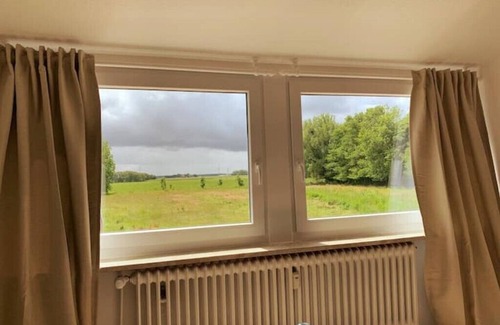 Nesse House | Ferienhaus Muschel mit Garten an der Nordsee