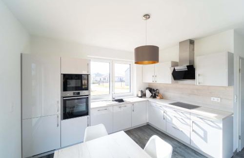 Barssel House | Ferienhaus Seeblick am Harkebrügger See mit Sauna und Kamin
