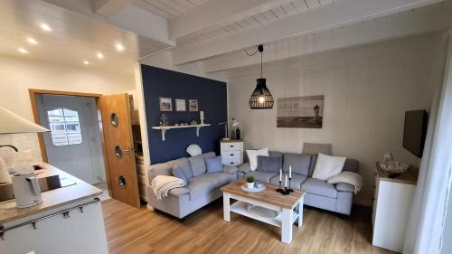 Neugarmssiel Apartment | Ferienhaus Seeschwalbe - Alte Schmiede Neugarmssiel