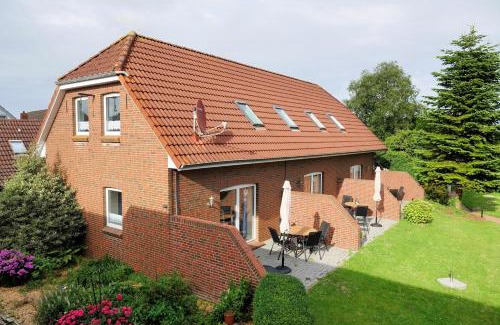 Neugarmssiel Apartment | Ferienhaus Seeschwalbe - Alte Schmiede Neugarmssiel