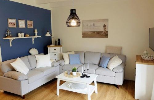 Neugarmssiel Apartment | Ferienhaus Seeschwalbe - Alte Schmiede Neugarmssiel
