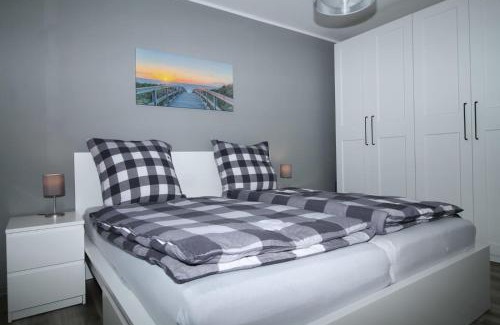 Barssel House | Ferienhaus Sonnenblick mit Sauna Harkebrügger See
