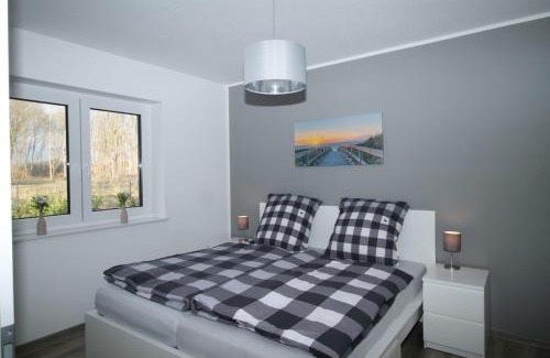 Barssel House | Ferienhaus Sonnenblick mit Sauna Harkebrügger See