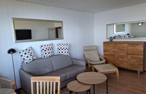 Schausende Apartment | Ferienwohnung Am Leuchtturm
