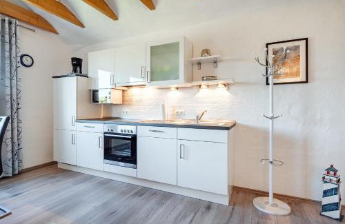 Tannenhausen Apartment | Ferienwohnung Ebbe mit Loggia und schönem Ausblick am Badesee Tannenhausen