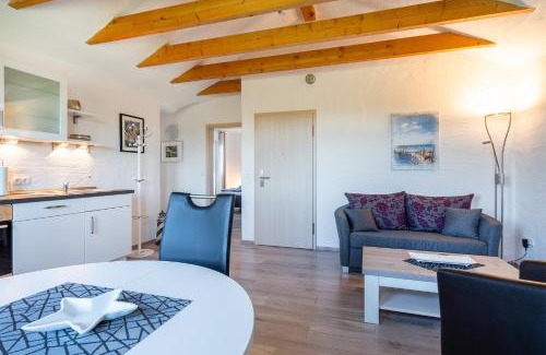 Tannenhausen Apartment | Ferienwohnung Ebbe mit Loggia und schönem Ausblick am Badesee Tannenhausen