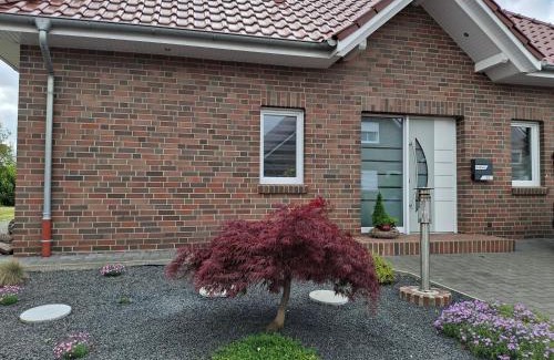 Veenhusen Apartment | Ferienwohnung "Haus Peter" 65357
