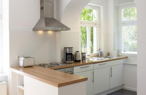 Bad Wildungen Apartment | Ferienwohnung Hufelandstern bis 7 Personen - mit E-Ladesäule!