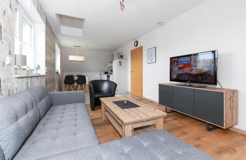 Neuharlingersiel Apartment | Ferienwohnung im Haus Hafenlicht