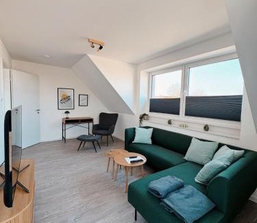 Neuharlingersiel Apartment | Ferienwohnung KÖÖK Heimathafen - Modern, Balkon, Strandnah