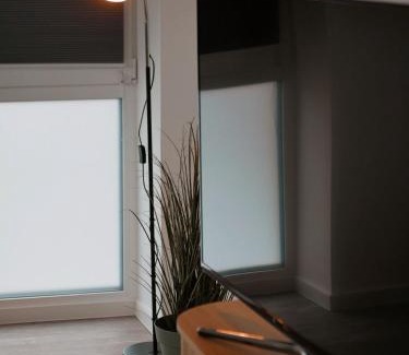 Neuharlingersiel Apartment | Ferienwohnung KÖÖK Heimathafen - Modern, Balkon, Strandnah