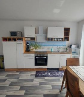 Neuharlingersiel Apartment | Ferienwohnung Krabbe im Haus-Neuharlingersiel