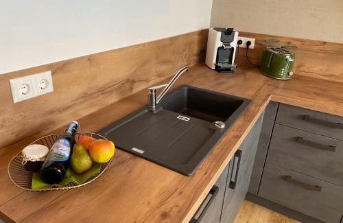 Oy Apartment | Ferienwohnung mit eigenem Garten und Bergblick