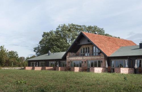 Muritz House | Ferienwohnung mit Kamin im Gut Ulrichshusen
