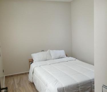 Cite Al Mohammadi Apartment | Ferienwohnung mit Stadt-und Meersicht