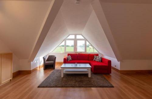 Lobbe Apartment | Ferienwohnung Mohnblume - Strandhaus Lobbe