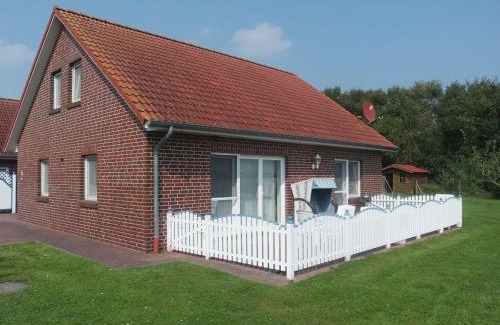 Esens Apartment | Ferienwohnung Muschel 2 mit gemeinschaftlichen Garten, Bensersiel