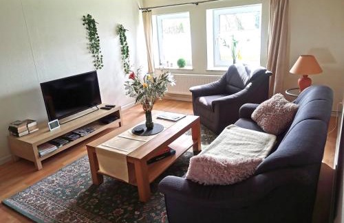 Roggenstede Apartment | Ferienwohnung Nordsee Gulfhof Dornum - mit großem Garten