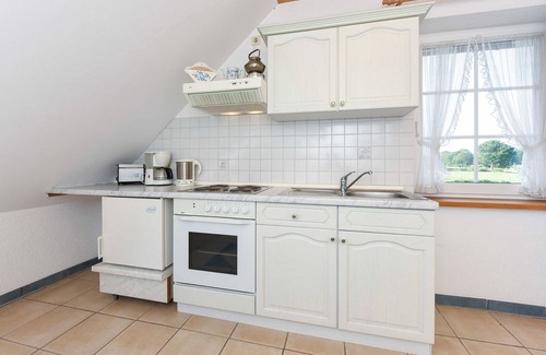 Dunum Apartment | Ferienwohnung Schwalbe - Ferienwohnungen Möwe und Schwalbe im Haus Sassenhof