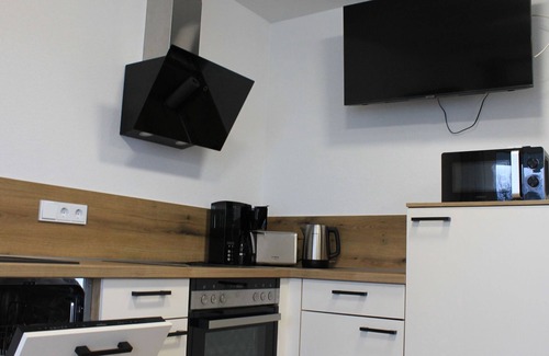 Scheid Apartment | Ferienwohnung Seeblick - Ferienwohnungen Am Alten Anker