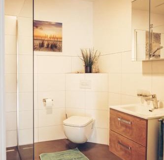 Schwanewede Apartment | Ferienwohnung Sonnenuntergangsidyll Harriersand