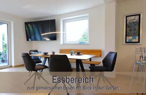 Hockelheim Apartment | FeWo Blaue Lagune Northeim- neu, modern, geräumig - 100 qm - 3 Schlafzimmer- bis 6 Gäste, Kleinkinder reisen gratis - mit Garten, Grill & Terrasse - Fußbodenheizung - Smart-TV - Küche mit Backofen Spühlmaschine, Toaster - Fahrradkeller - nahe Göttingen