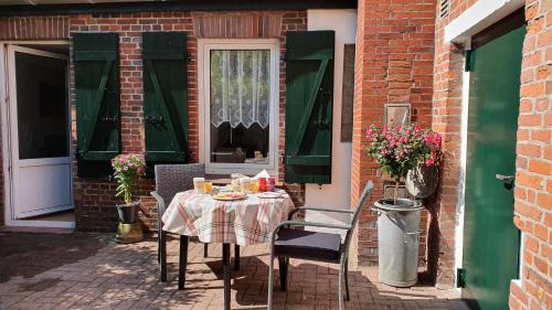 Dornumersiel Apartment | FeWo-Butze 2 mit Terrasse